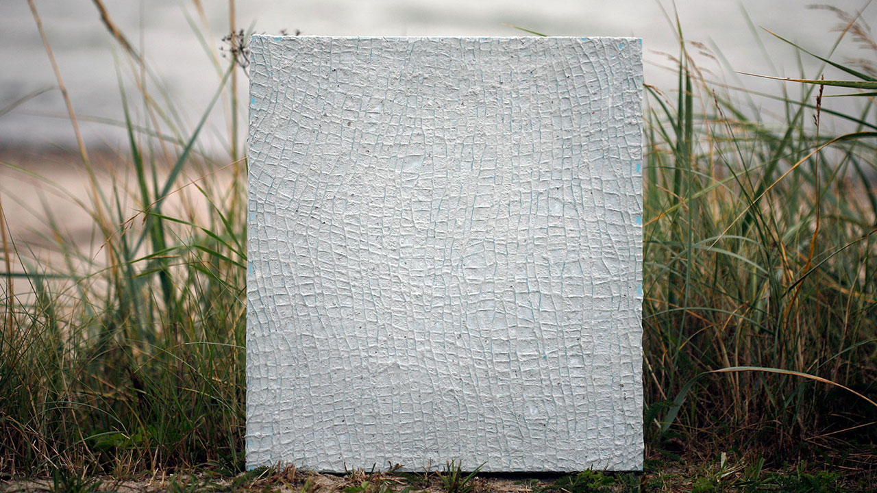 Megastrik med papirler spændt ud som et billede